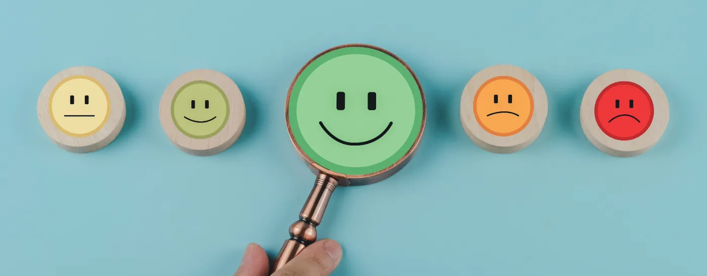 Magnifying glass enlarging rating icons on a customer service survey